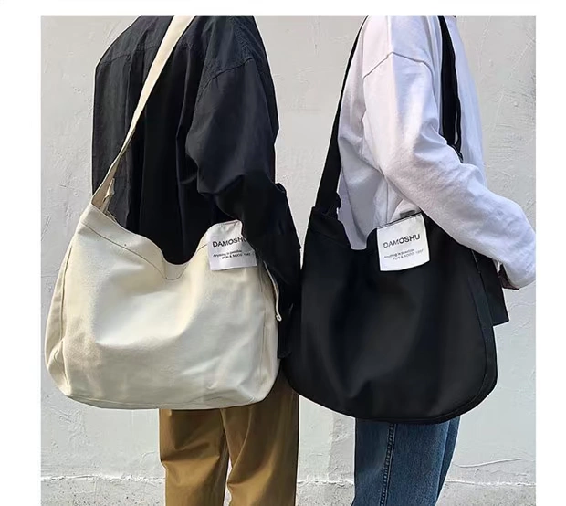 2020 new art messenger bag unisex all-match bag đeo vai Harajuku cặp đôi giản dị túi vải sinh viên - Túi của con người