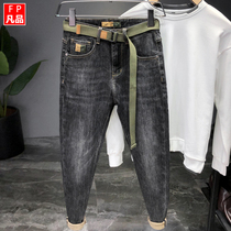 2021 autumn black Korean fashion slim stretch mens small feet jeans Tide brand high-end spring and autumn long trousers