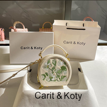 CaritKoty high-end embroidered small round bag 2023 spring new commuter niche handbag female Messenger