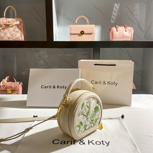 CaritKoty high-end embroidered small round bag 2023 spring new commuter niche handbag female Messenger