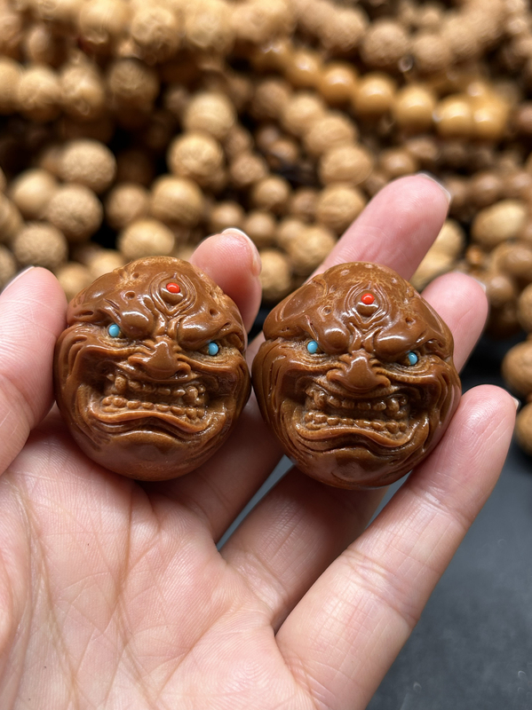 Two Resin-Encased Muscle Flame Demon Pendants, Brazilian Large Olive Stone Carved Hand-Held Ornaments, Handball