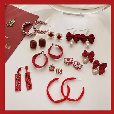 New Year's festive red earrings, a retro winter style with a plush bow, a unique and skin-enhancing white earrings and stud earrings for women