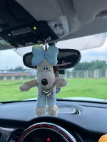 Синие шерстяные брюки щенка, висящая с ароматерапевтическими фильмами