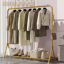 Light extravagant clothes rack floor bedroom folding balcony sunning clothes rack Home cool clothes rods Easy indoor hanging clothes hanger