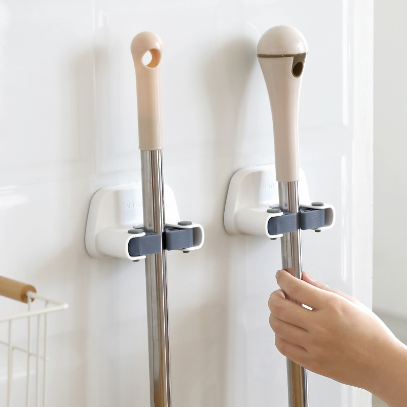 Non-perforated mop hook Strong adhesive broom rack Bathroom household non-nailed wall-mounted mop clip