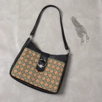 Кожаная детская сумка с цепочкой через плечо