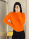 Minimalist cos style orange pullover round neck long sleeve knitted slim sweater commuter top 23 autumn new style for women