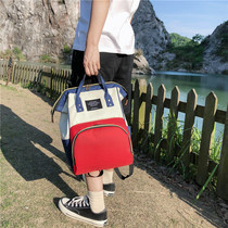 Mommy bag 2020 new popcorn Fashion Oxford Cloth Out of Light Large Capacity Hand Mother and Child Shoulder Backpack Tide