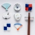 Nhật Bản sáng tạo đũa giữ đũa dễ thương giữ gốm khung hộ gia đình hỗ trợ bàn đũa đũa đũa bộ đồ ăn bút