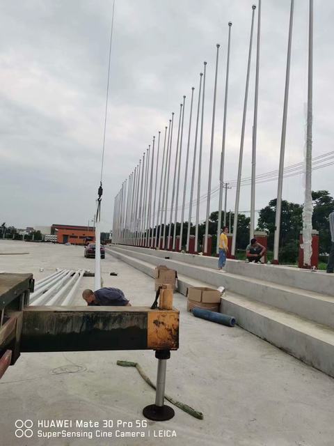 ສະແຕນເລດ tapered flagpole ໂຮງຮຽນວິສາຫະກິດກາງແຈ້ງ customized 6 ແມັດ 9 ແມັດ 10 ແມັດ 12 ແມັດ 15 ແມັດຄູ່ມືໄຟຟ້າ