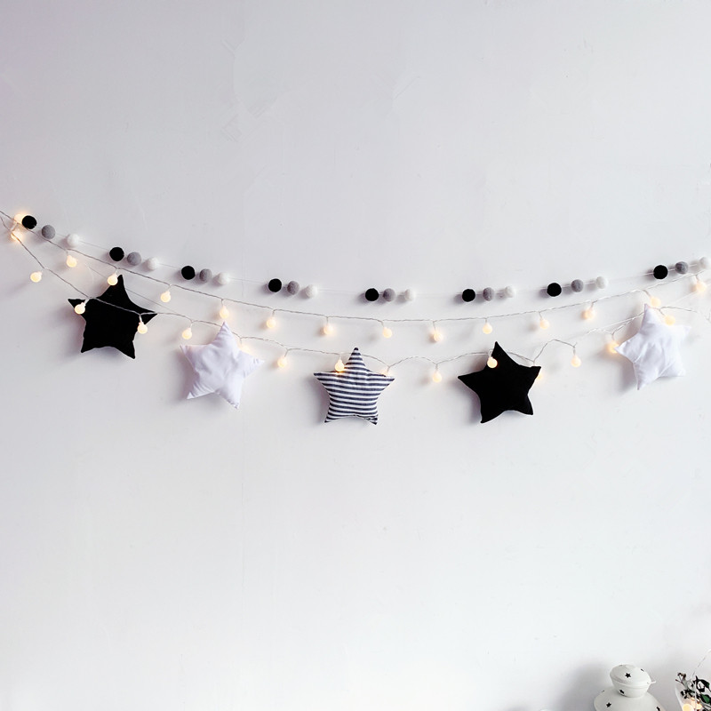 In red room arranged for Nordic wind home decoration wall decoration triangle star ball string hanging parts