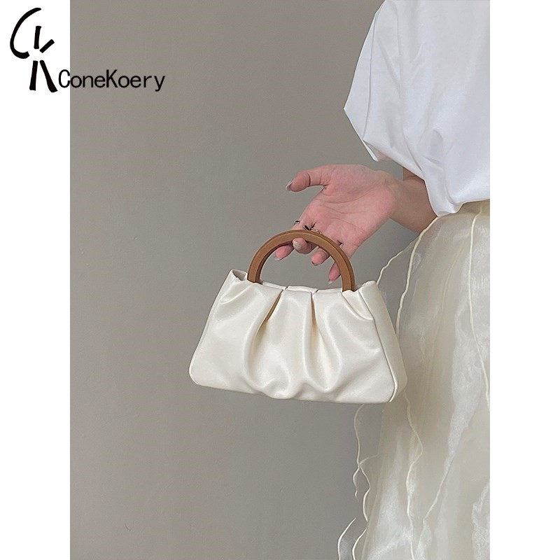 Cone Koery Leather 2023 New Wood Handle Crushed Cloud Handheld Lady Slipper Mini bag