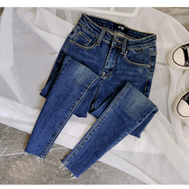 Simple basic elastic middle waist elastic nine-point jeans female Korean version of thin dark blue pants tide spring and autumn