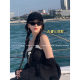 Showing face with little black cat-eye sunglasses sunglasses