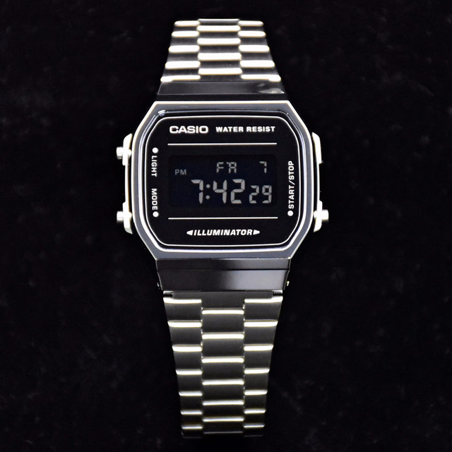 small silver casio watch