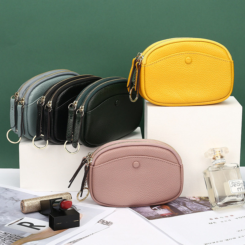 First layer cowhide hand bag female 2021 new double zipper change key bag Korean version simple short wallet coin bag