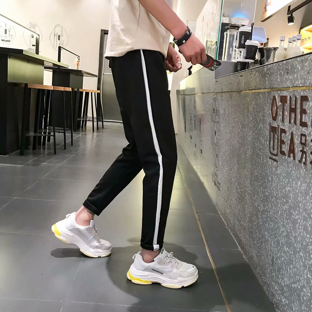 Quần âu mới 2018 cho nam mùa đông cộng với quần nhung dày thể thao rộng rãi quần áo nam