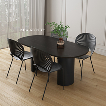 Nordic black wood dining table and chair combination designer home restaurant light luxury retro rectangular marble table
