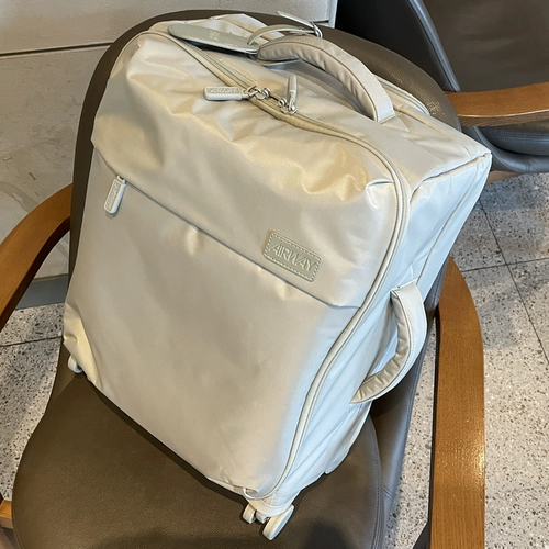 Японский сверхлегкий нетканый универсальный водонепроницаемый чемодан