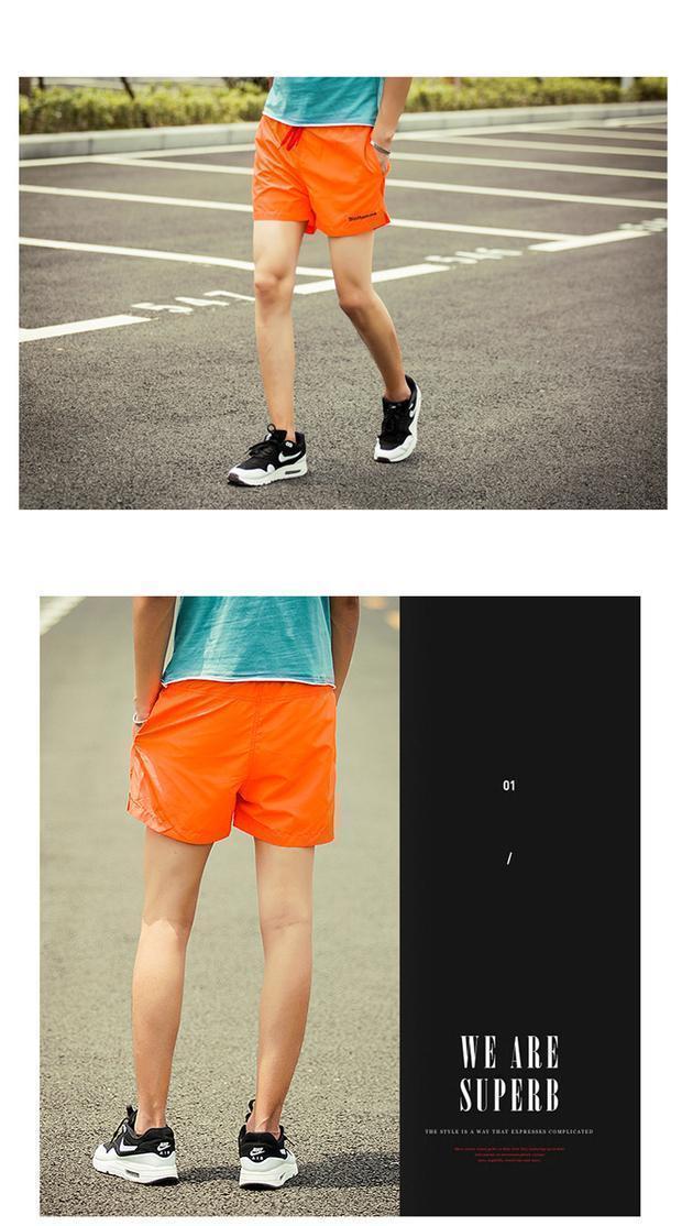 Những ngày hè cực ngắn quần short nam đôi nam bình thường thể thao chạy xu hướng ba quần nhanh khô quần nóng phiên bản Hàn quần đùi
