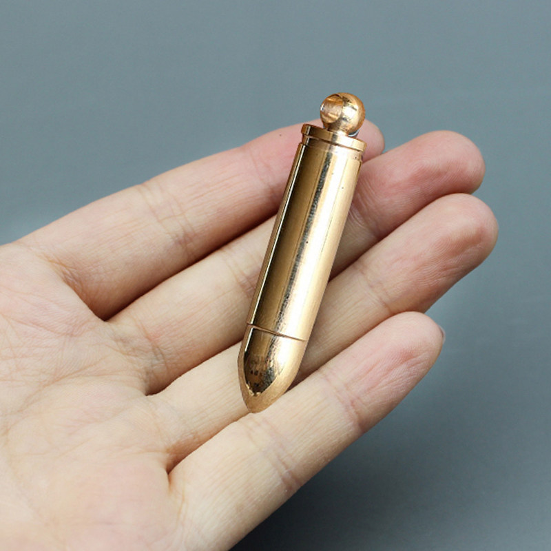 Bullet brass outdoor mini medicine bottle moisture-proof small medicine box carry-on sealed first aid portable waterproof warehouse pendant