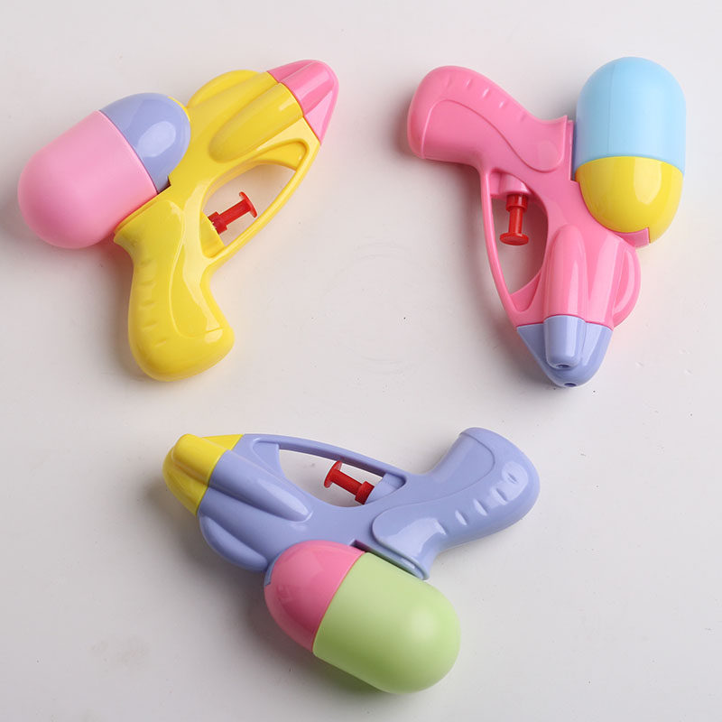 Than love children bathing and playing with water spray toys baby beach colorful cute small water gun boys and girls with a long range