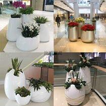 Lobby FRP art flower pot combination shopping mall Mei Chen big flower outdoor oval floor vase custom manufacturer