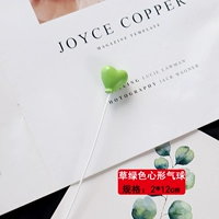 Зеленый воздушный шар в форме сердца