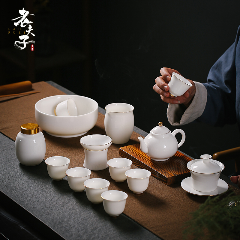 Dehua white porcelain tea set household contracted kung fu paint edge suet jade porcelain office tea cup lid bowl