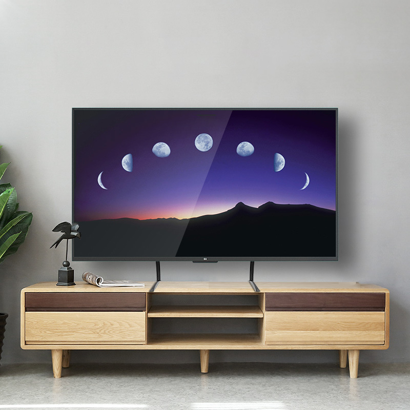 LCD TV Base bracket desktop heightening universal 3275 inch Xiaomi Sharp Haixin Genesis TCL