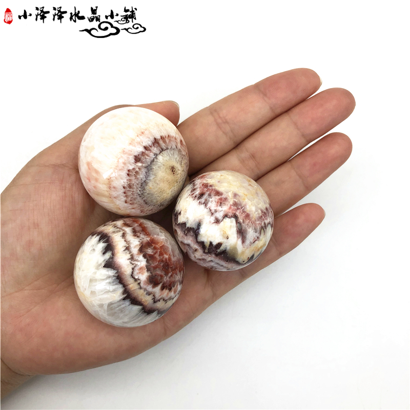 Natural crystal red stone ball love heart-shaped pork stone ball ornaments original ore ball crystal ball