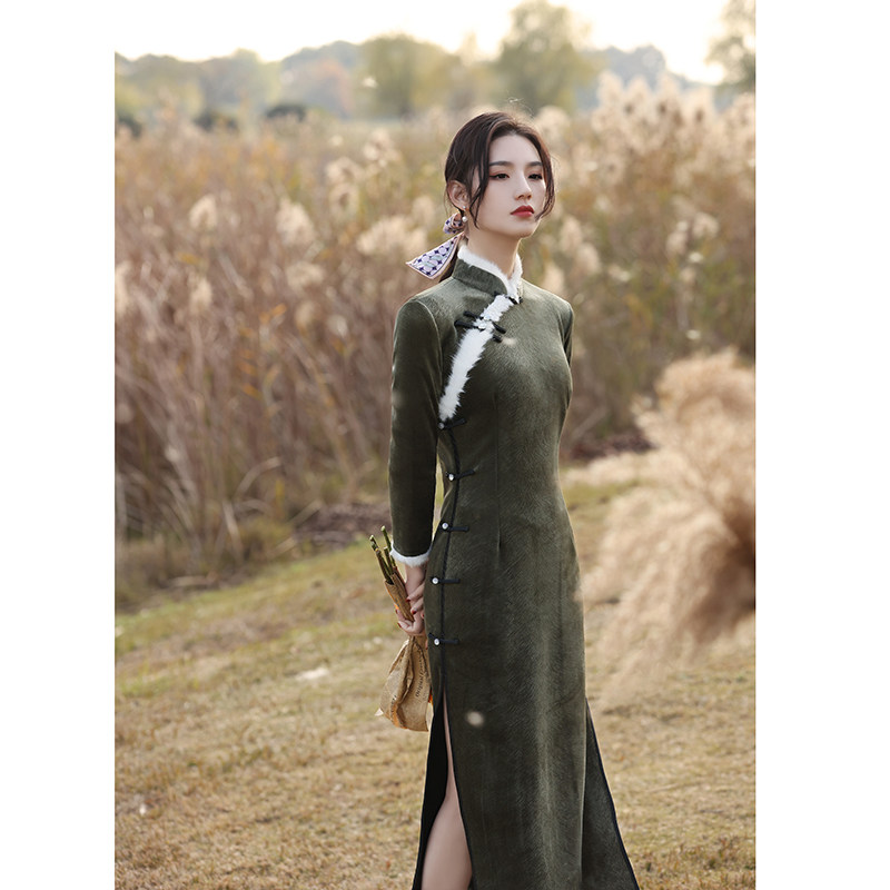 Cheongsam women's winter thick winter clothes 2021 new autumn and winter long sleeves warm plus velvet improved winter dark green