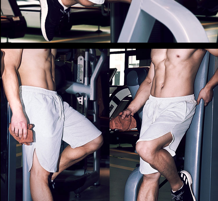Cơ bắp anh trai tập thể hình thể hình chạy thể lực tập luyện squat lỏng năm điểm quần short cotton dây kéo túi quần dài nam