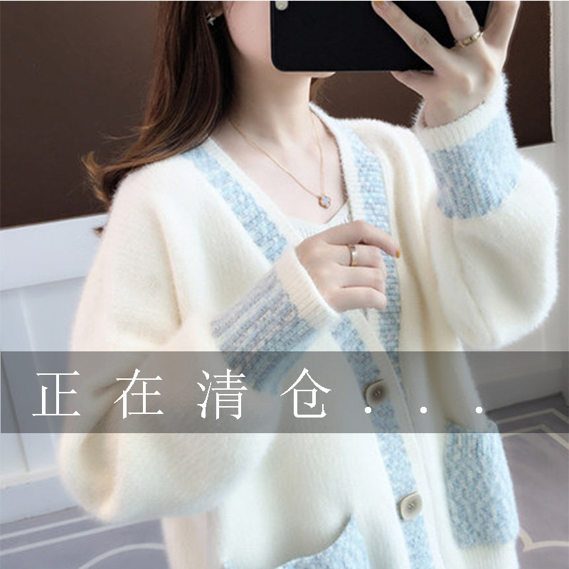 In autumn 2022 a new woman knitting sweater is loose and wears an autumn and winter mink plus coat