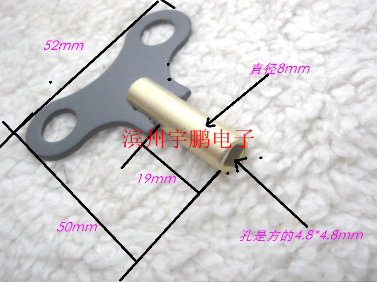 Old watch and watch key Old Arctic Star Three-five mechanical timepiece accessories Old hanging bell seat clock on floor clock with clockwork wrench