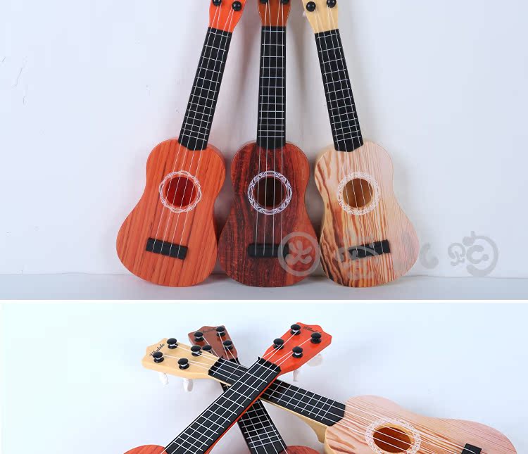 [Hàng ngày khuyến mãi] trẻ em âm nhạc mini guitar mô phỏng có thể chơi ukulele bé đồ chơi âm nhạc