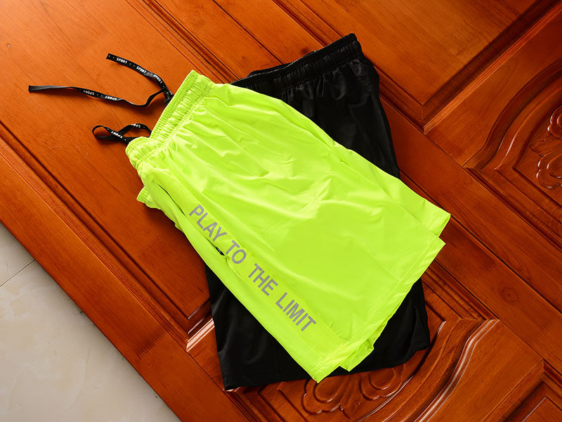 Fast dry elastic fabric Foreign trade men's clothing factory cut tail goods outdoor sports running shorts five - trimmer