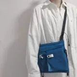 韩系斜挎包男女2022春日常街头潮牌设计感多口袋大容量工装单肩包