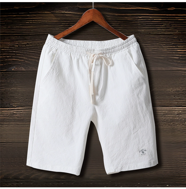 Thể thao mùa hè 5 năm quần nam cotton và linen shorts quần âu quần bãi biển mùa hè quần lớn phần mỏng thủy triều