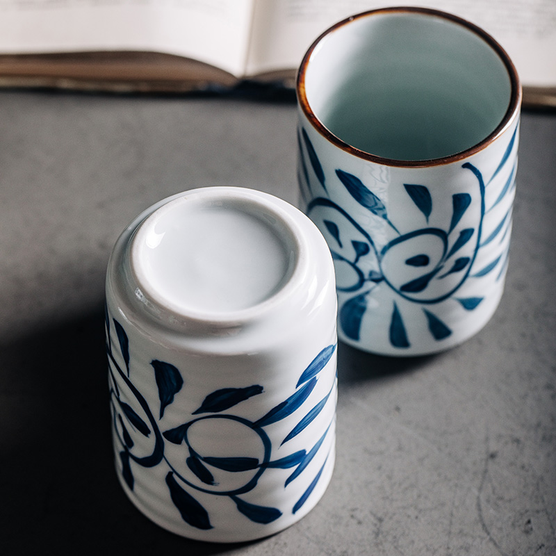Japanese household water glass ceramic keller with a cup of creativity under the horizontal stripes antiskid hand - made glaze color tea cup