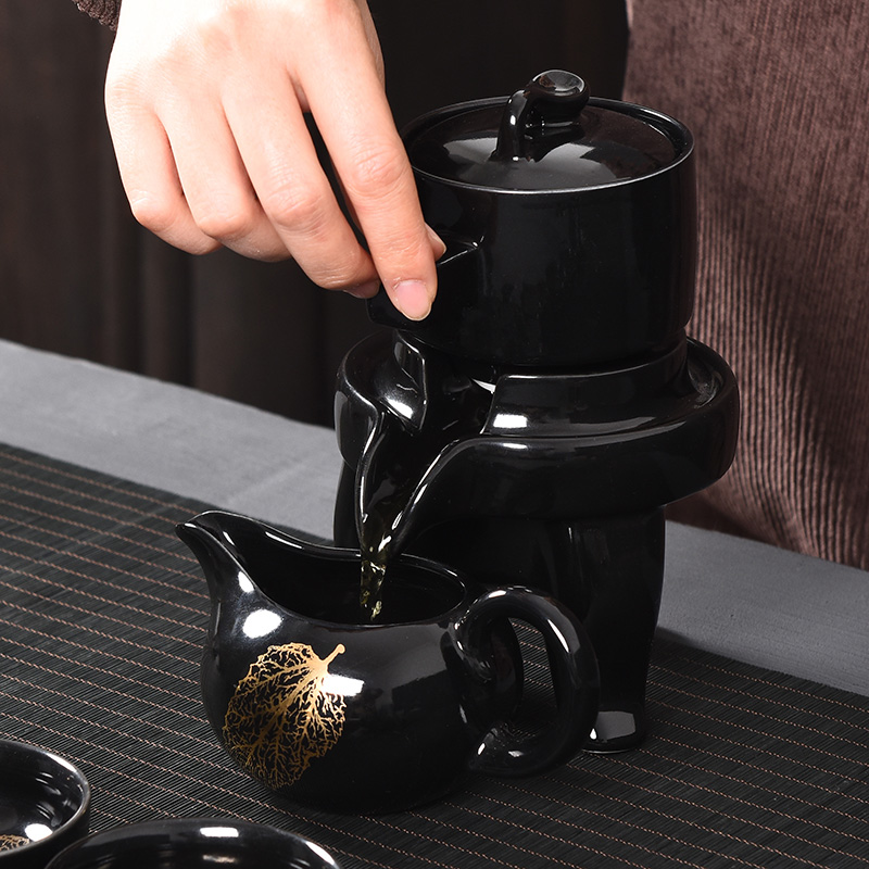 Tao blessing temmoku built light gold konoha lamp automatic tea set suit household lazy man stone mill of a complete set of automatic tea set