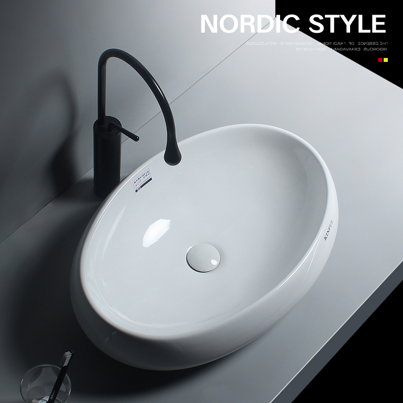 Nordic oval goose egg shaped table basin Wash basin Ceramic creative art basin Hotel powder room wash basin Wash basin