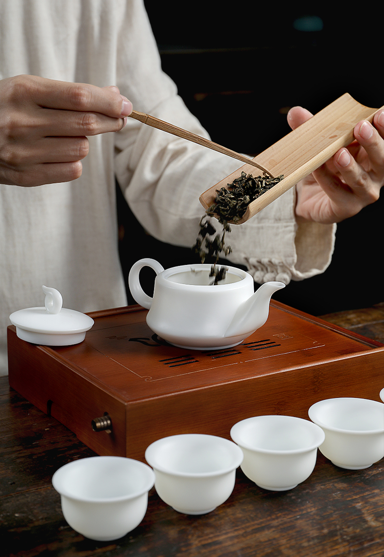Mud seal dehua white porcelain tea sets suet jade porcelain kung fu tea set household Chinese white ceramic teapot gift boxes