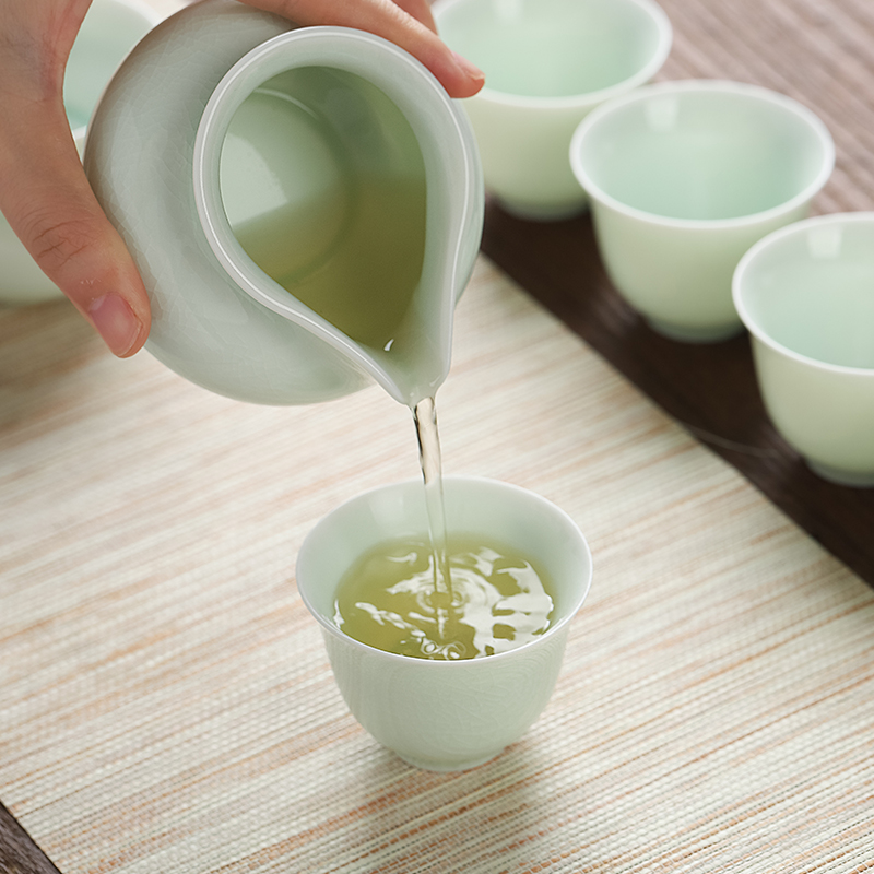 Mud seal kung fu tea set suit household contracted Japanese green lotus glaze ceramic teapot hand - made teacup gift boxes