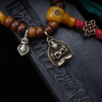 Tibetan Ming Dynasty Xialu style four-arm Guanyin rubbed mold yellow Lima copper pendant pendant side hanging