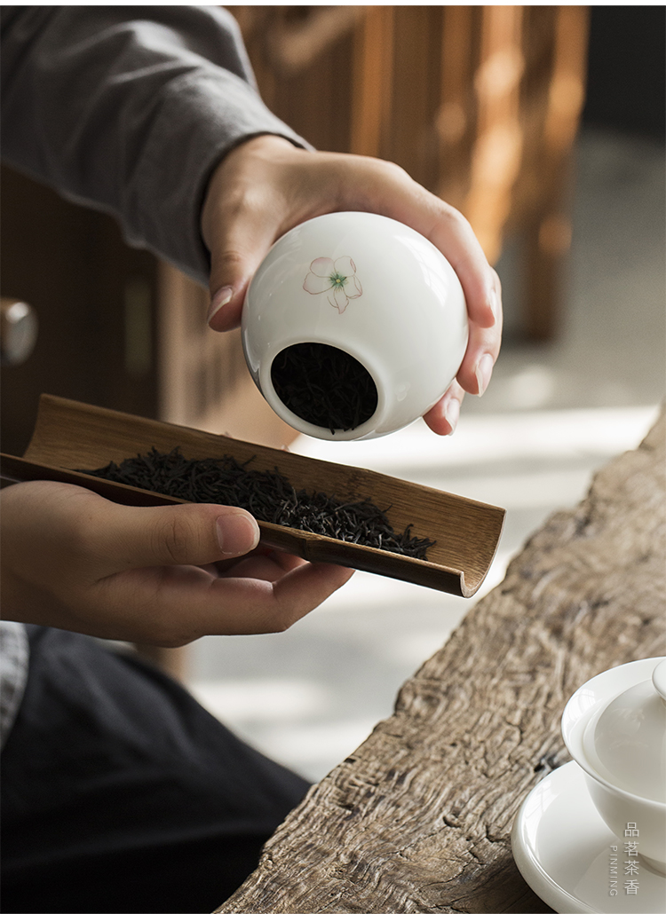 Plain film white porcelain small ceramic tea caddy fixings portable storage tanks miles peach blossom put with cover sealed container pot