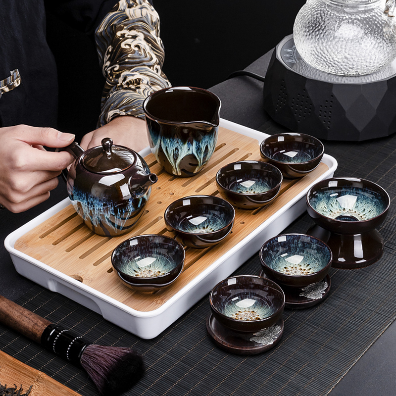 Build light tea set household kung fu tea cups of a complete set of ceramic teapot up temmoku glaze up alluvial gold tea ware