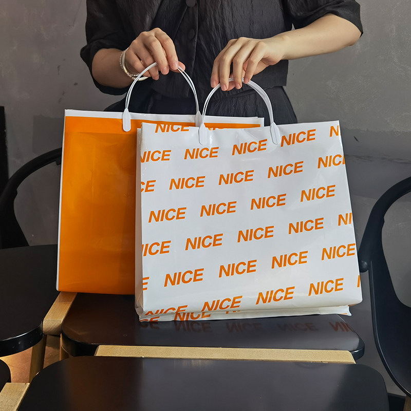 Orange Upscale Handbag Clothing Shop Bag Plastic Gift Gift Baggy Clothes Shopping Bag Set for hand carrying
