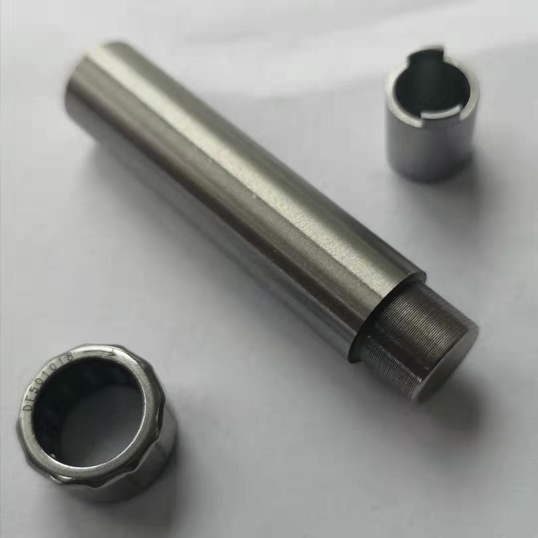 Large and DAIWA Jubilee Manoshimano drop wheel stainless steel unidirectional bearing disassembly tool