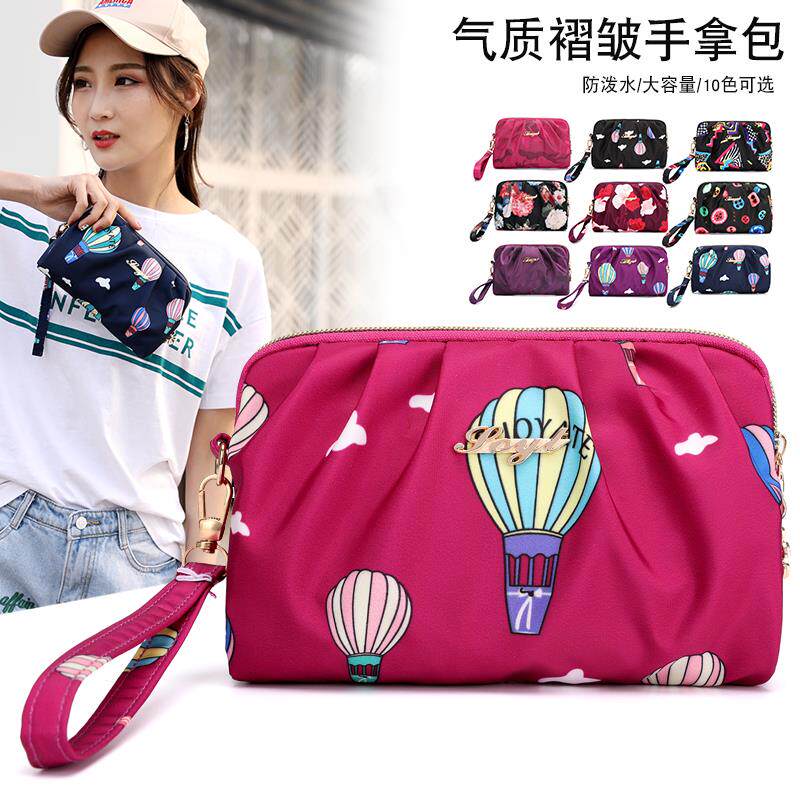 Woman bag new mobile phone pack lady Han version of waterproof nylon Oxford cloth mom wrist wrist change wallet handbag